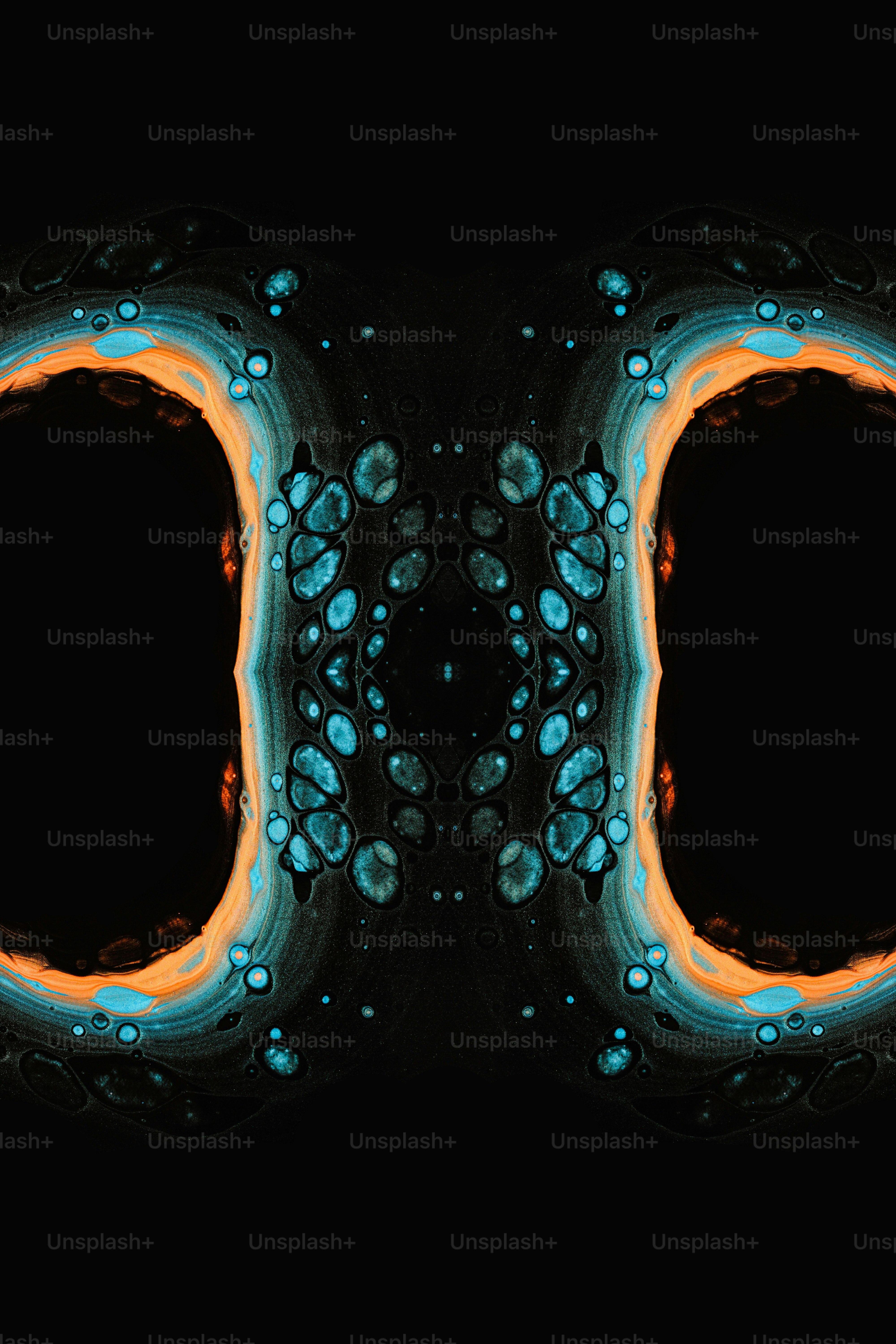 a black background with blue and orange circles