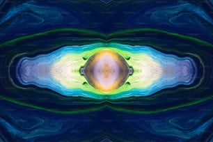 an abstract image of a blue, yellow and green object
