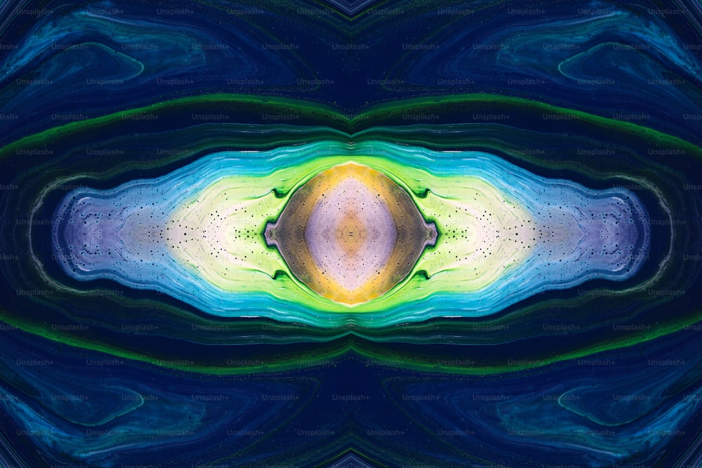 an abstract image of a blue, yellow and green object