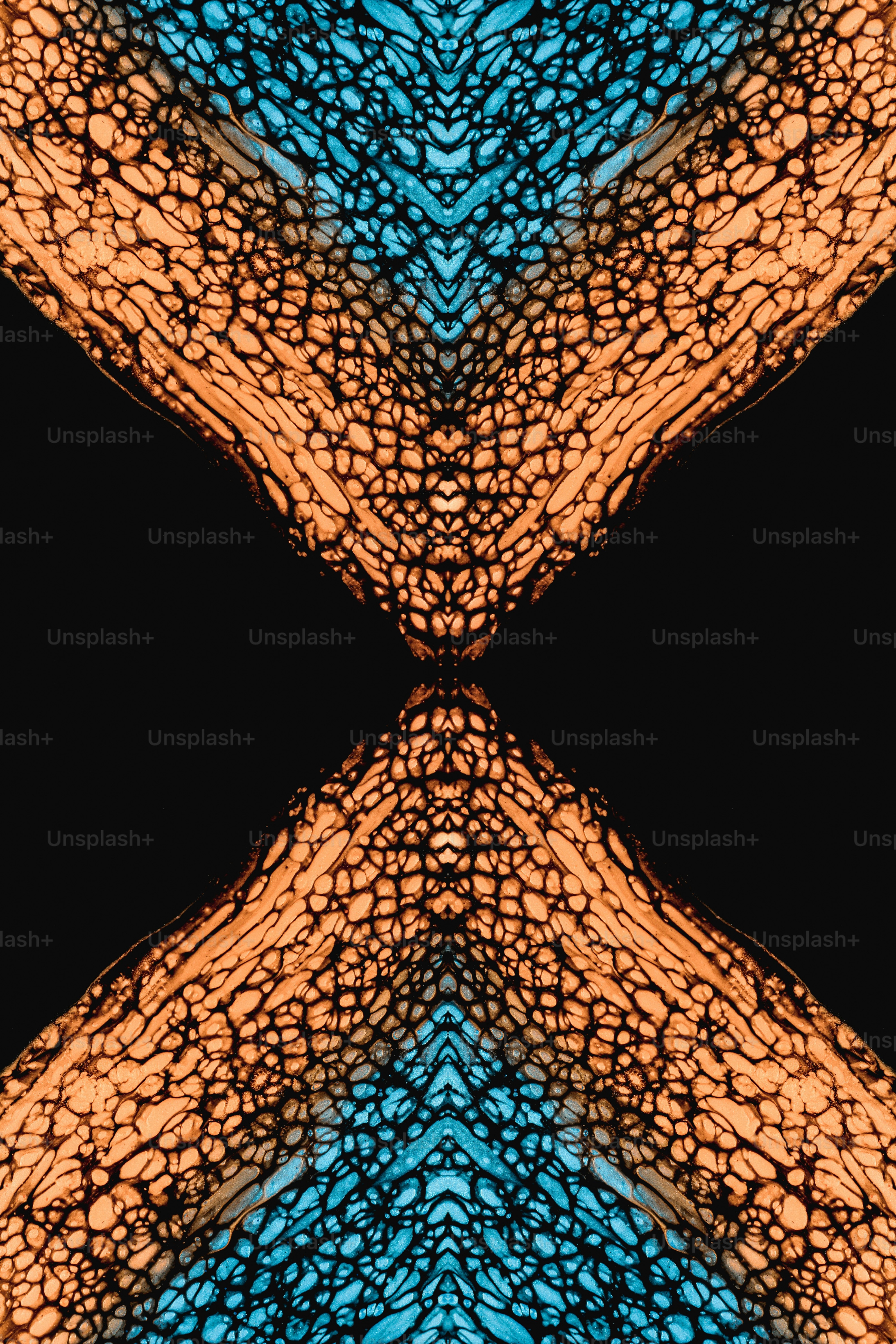 a blue and orange pattern with a black background