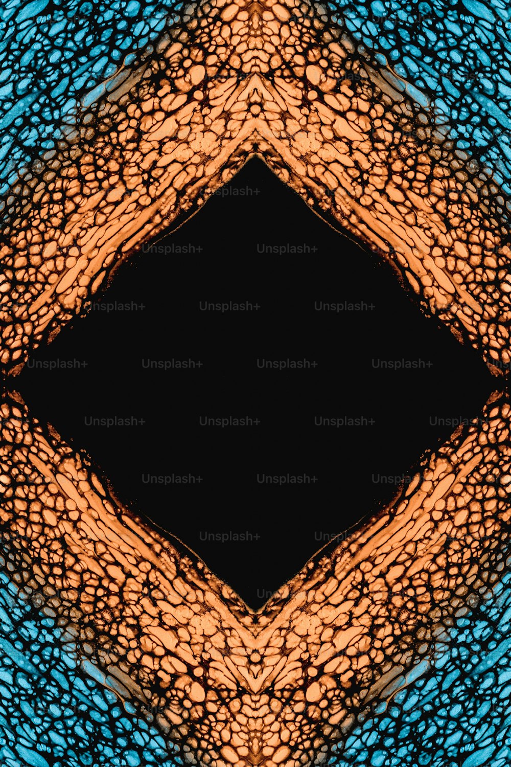 a blue and orange pattern with a black center