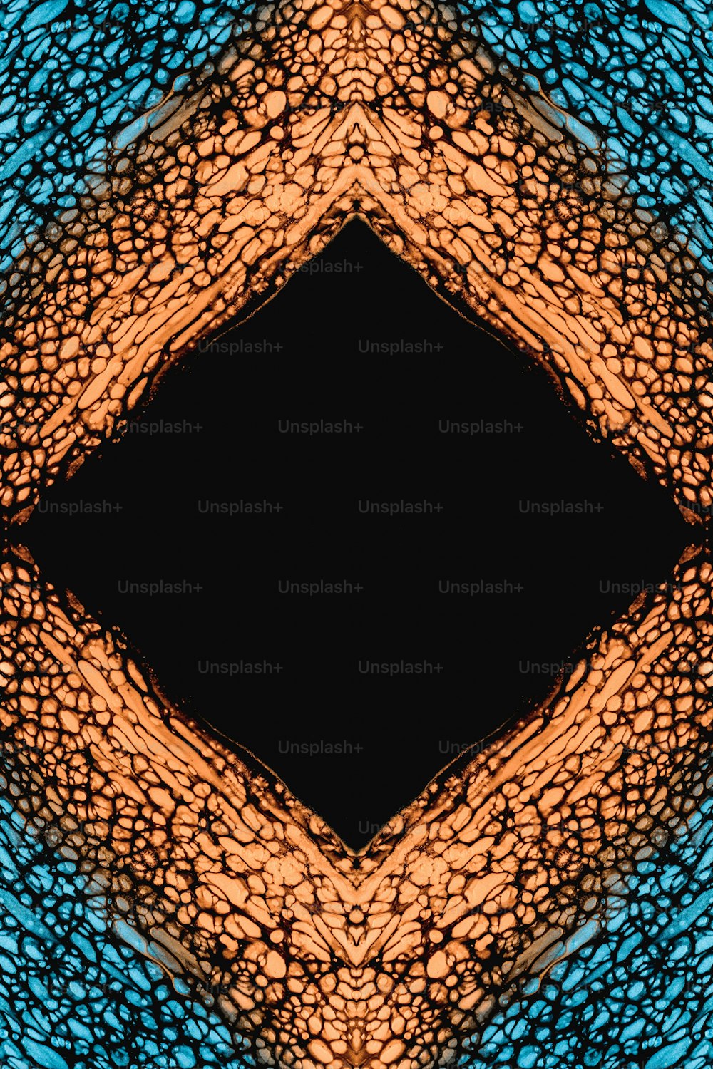 a blue and orange pattern with a black center