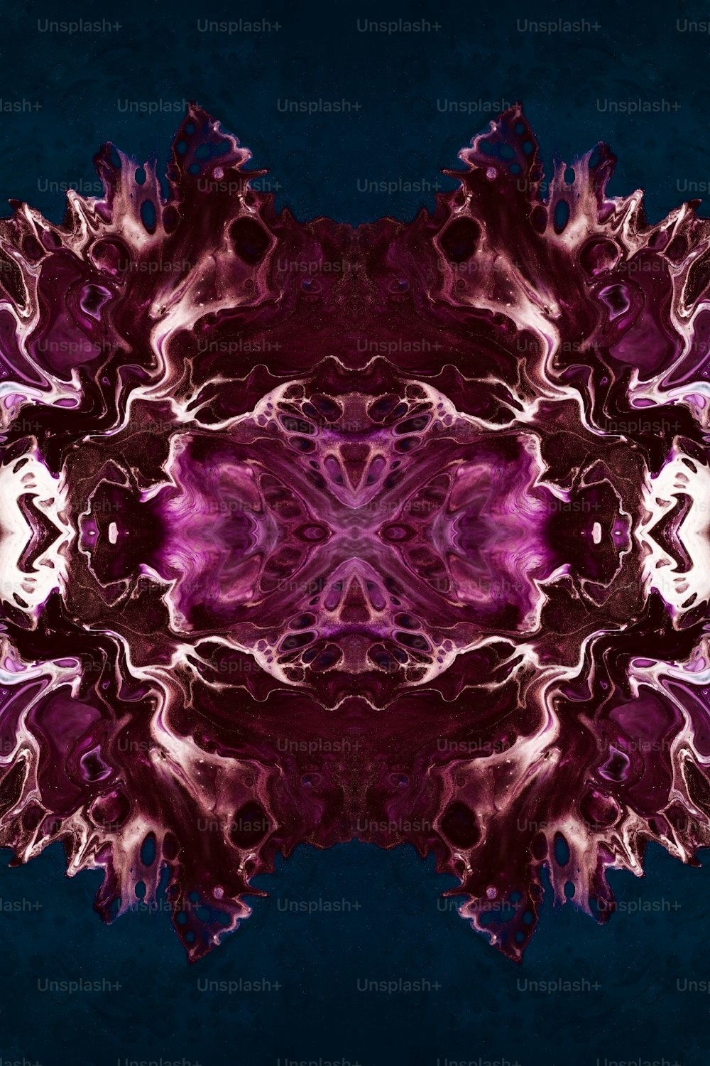 an abstract image of a purple flower