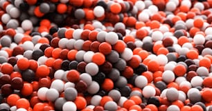 a pile of red, white, and black candies