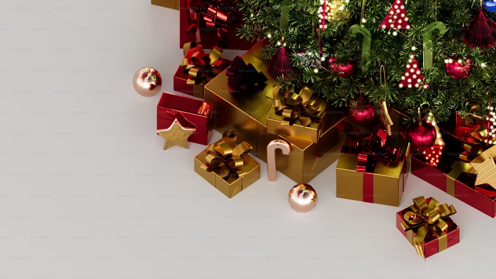 Un gruppo di regali di Natale sotto un albero di Natale