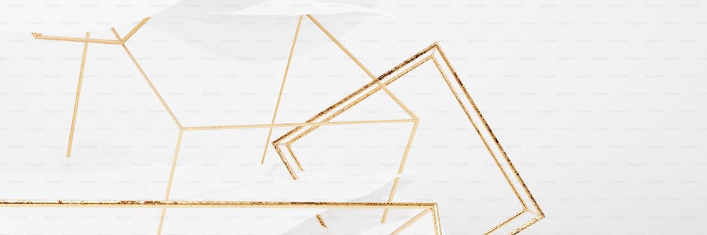 a white background with gold geometric shapes
