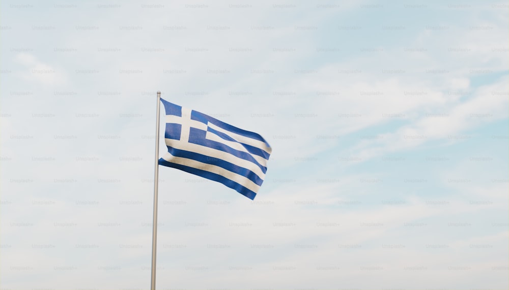 a flag flying in the wind with a blue sky in the background