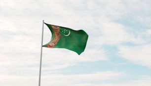 a green flag flying in the wind on a cloudy day