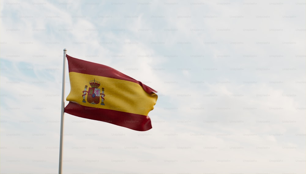 a flag flying in the wind with a sky background