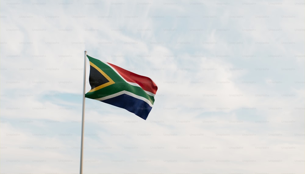 a flag flying in the wind on a cloudy day