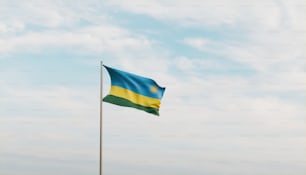 a flag flying in the wind on a cloudy day