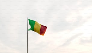 a flag flying in the wind on a cloudy day