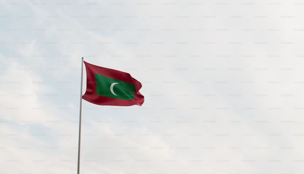 a flag flying in the wind on a cloudy day