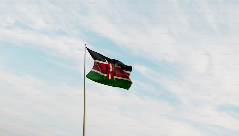 a flag flying in the wind on a cloudy day