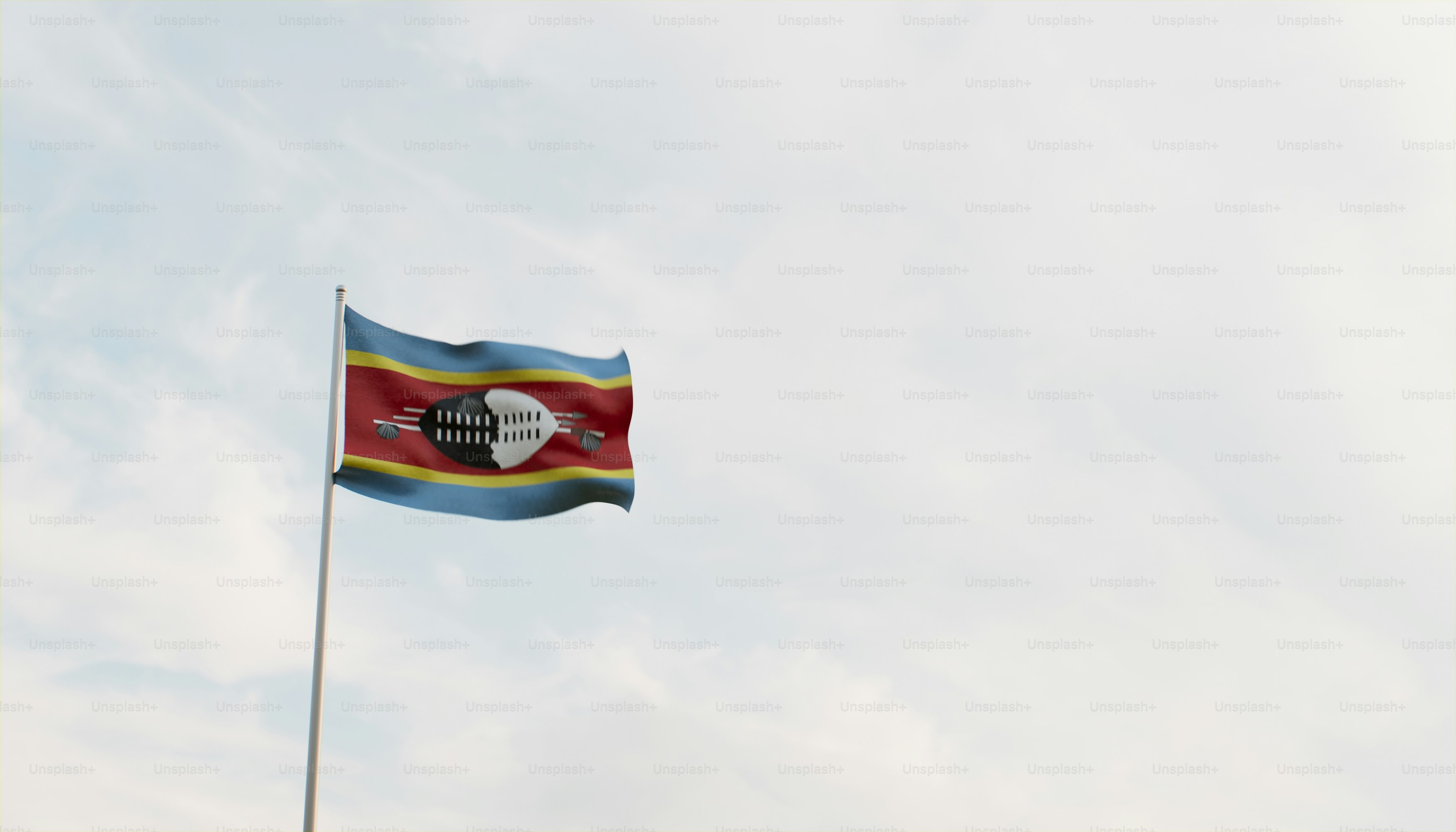 a flag flying in the wind on a cloudy day