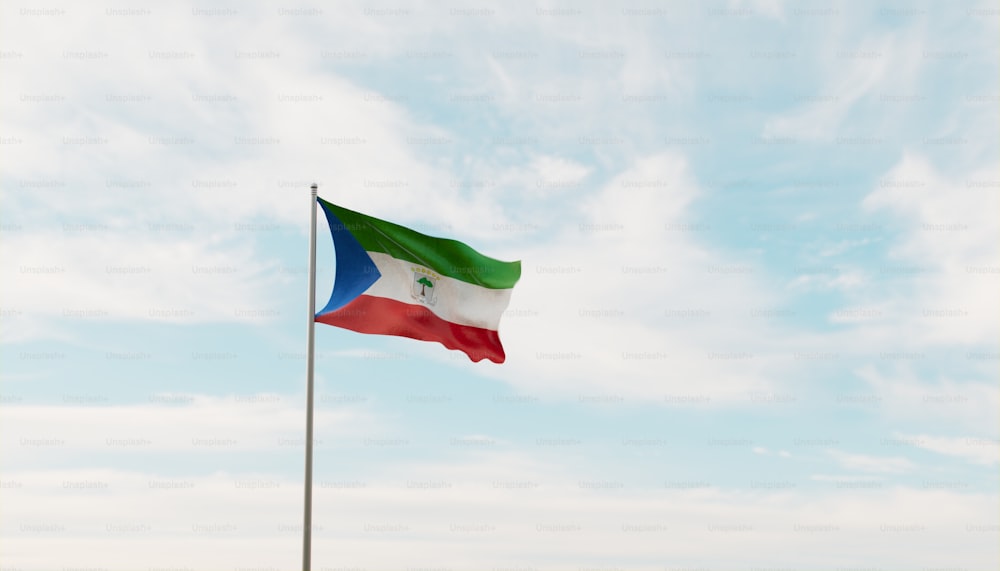 a flag flying in the wind with a sky background