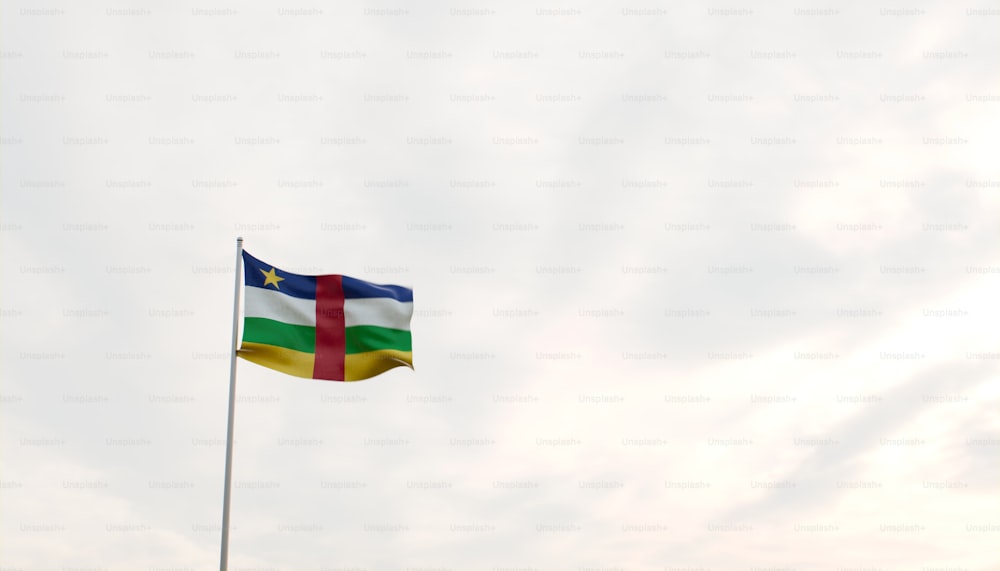 a flag flying in the wind on a cloudy day