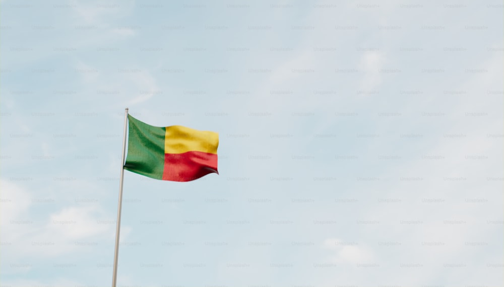 a flag flying in the wind on a sunny day