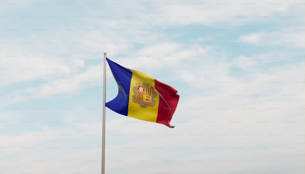 a flag flying in the wind with a blue sky in the background