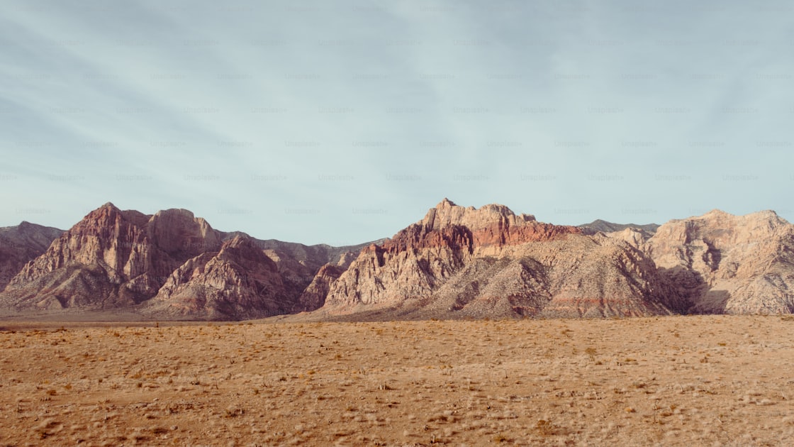 High desert mountain range in Nevada at sunrise with rugged terrain and open sagebrush flats