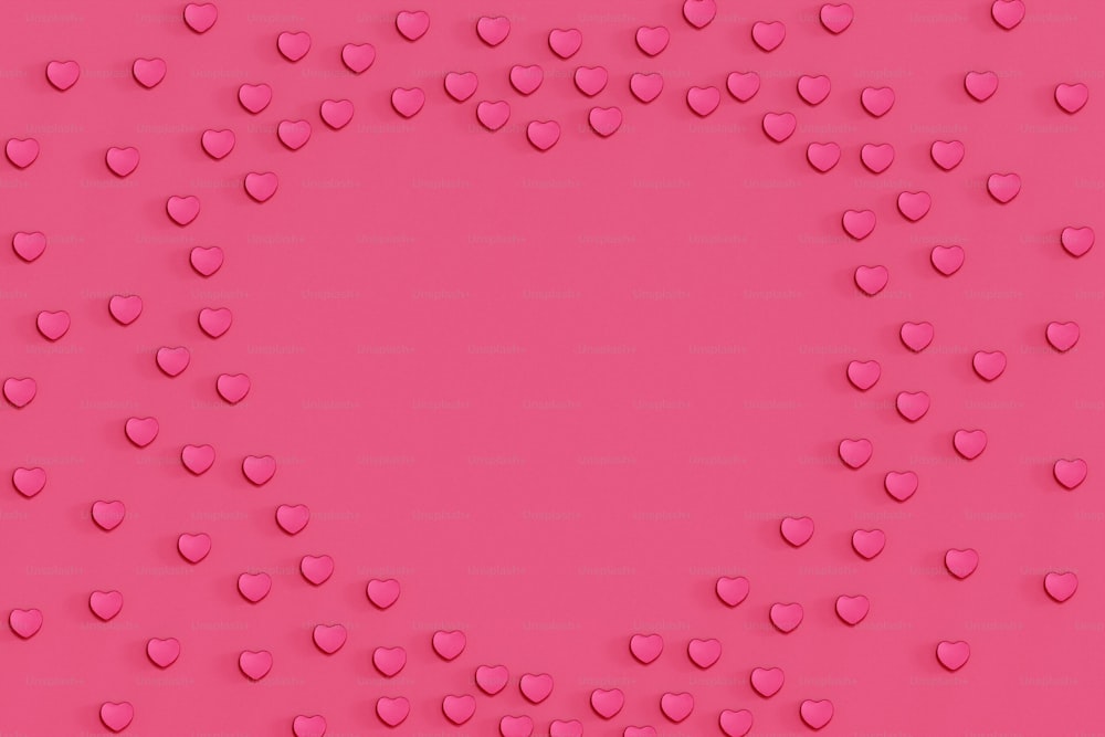 a pink background with lots of hearts on it
