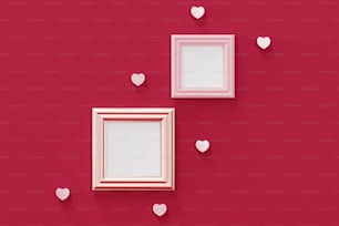 Dos marcos con corazones en una pared roja