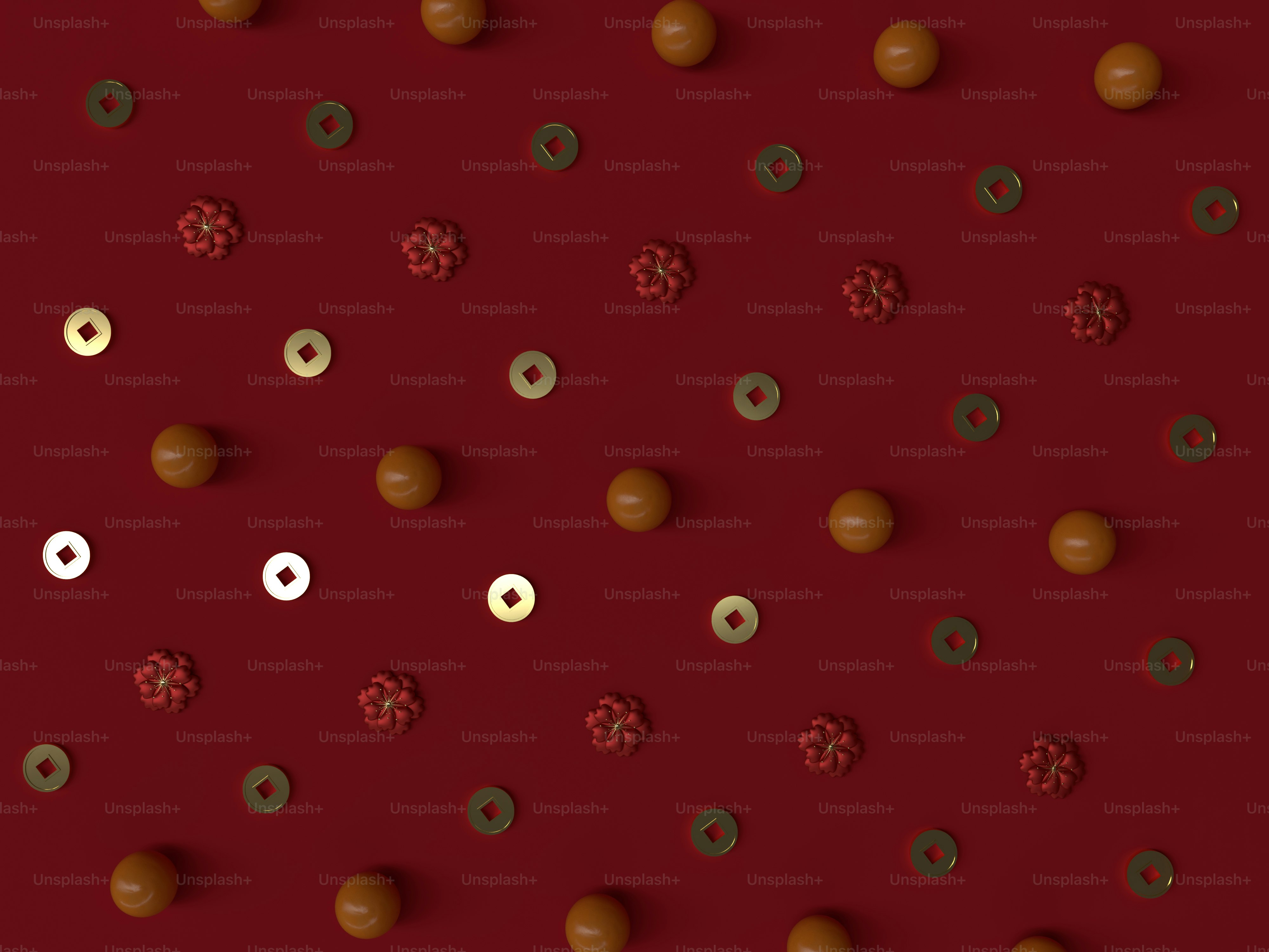 a bunch of donuts that are on a red surface