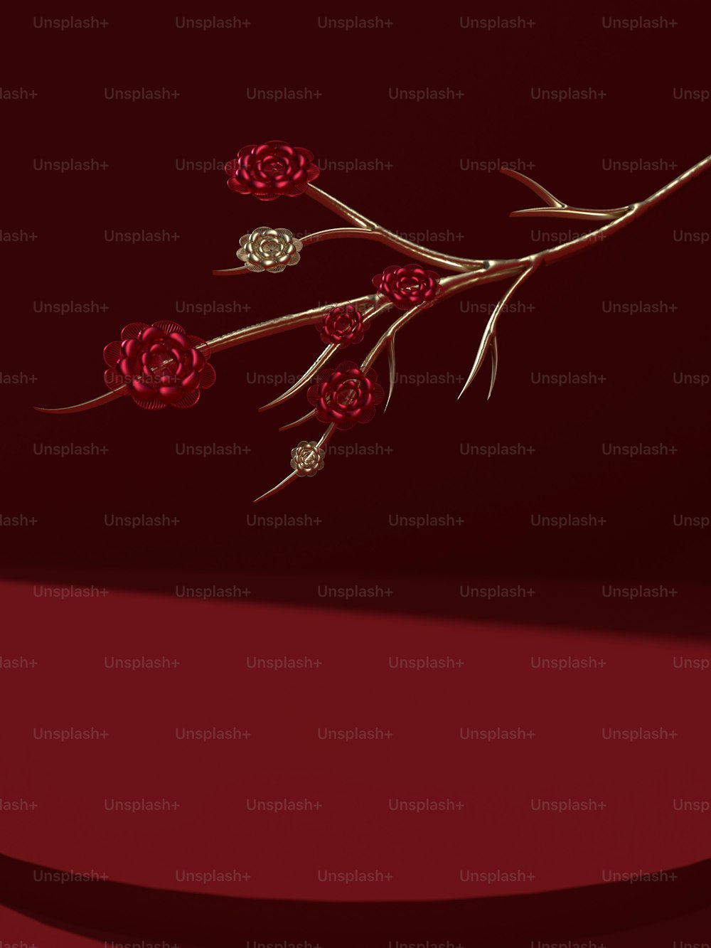 una rama con flores rojas sobre un fondo rojo