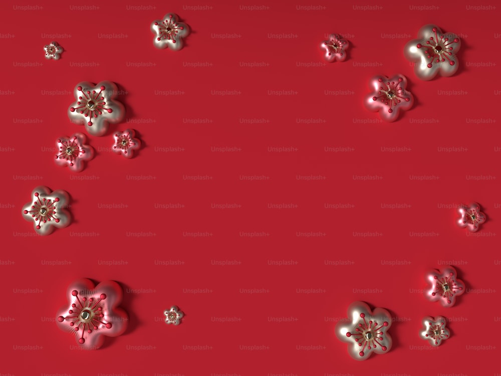 a red background with white and silver flowers