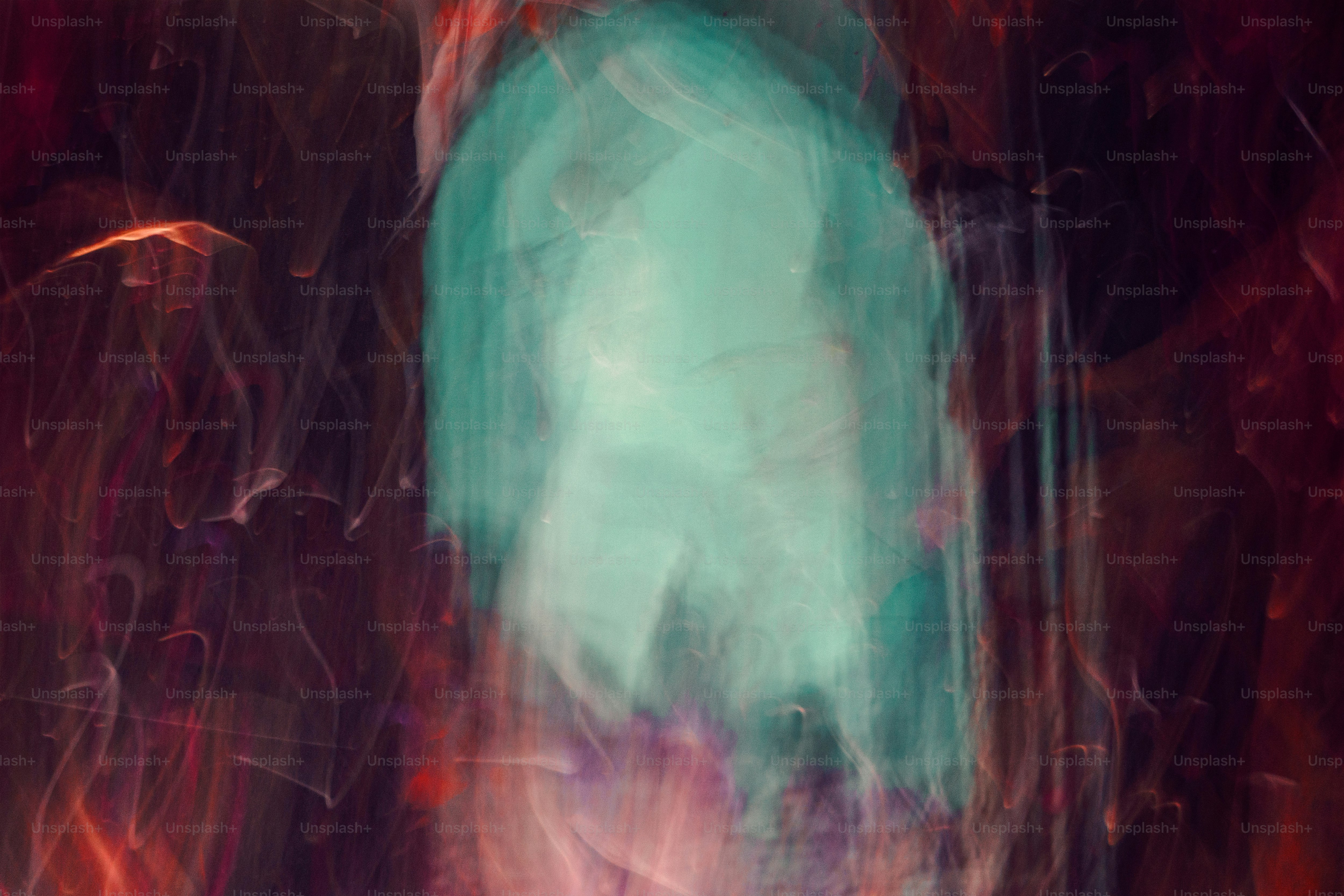 a blurry image of a green and red object