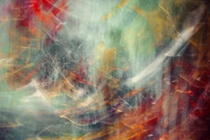 an abstract painting of red, yellow, and green colors