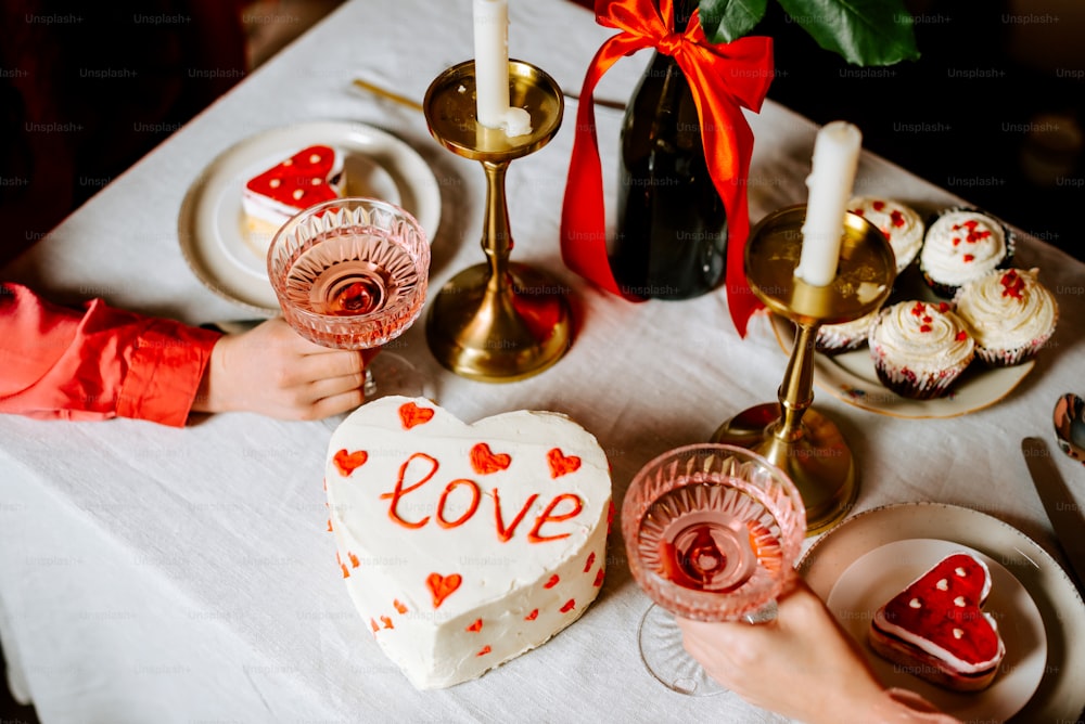 a heart shaped cake sitting on top of a table