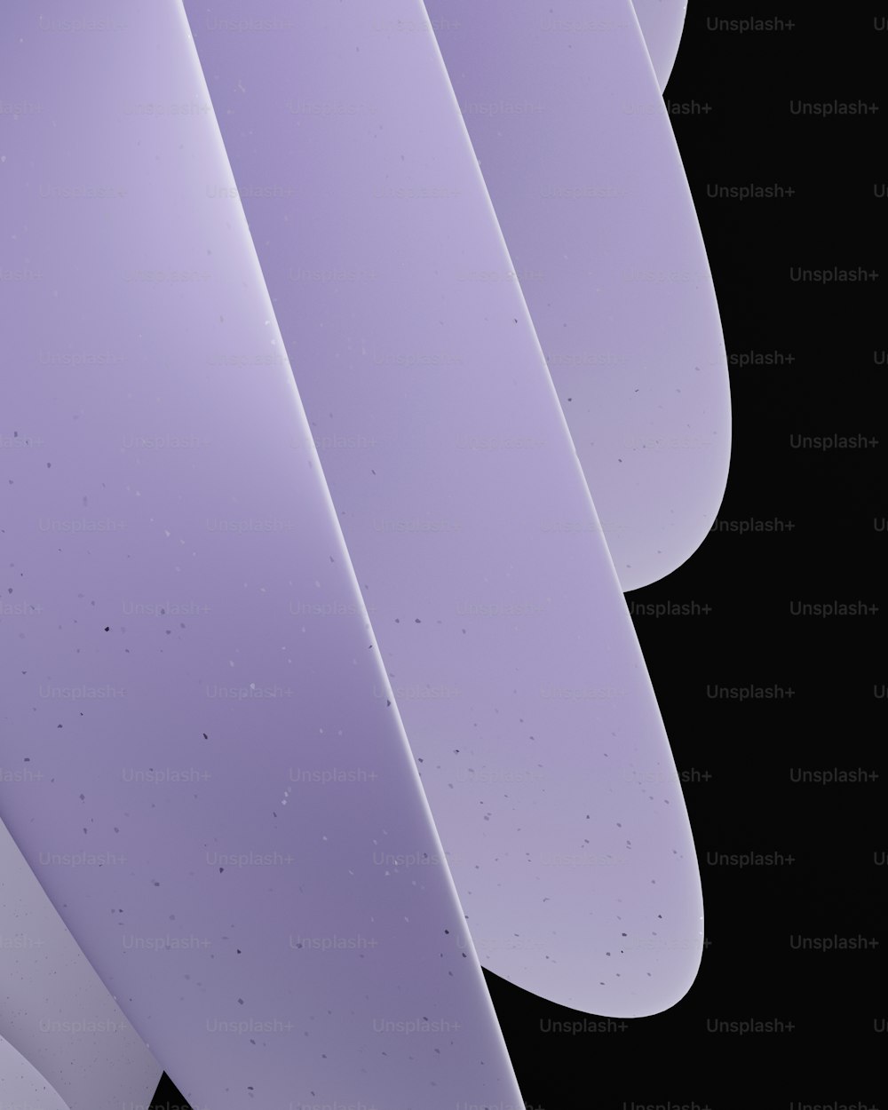 a close up of a surfboard on a black background
