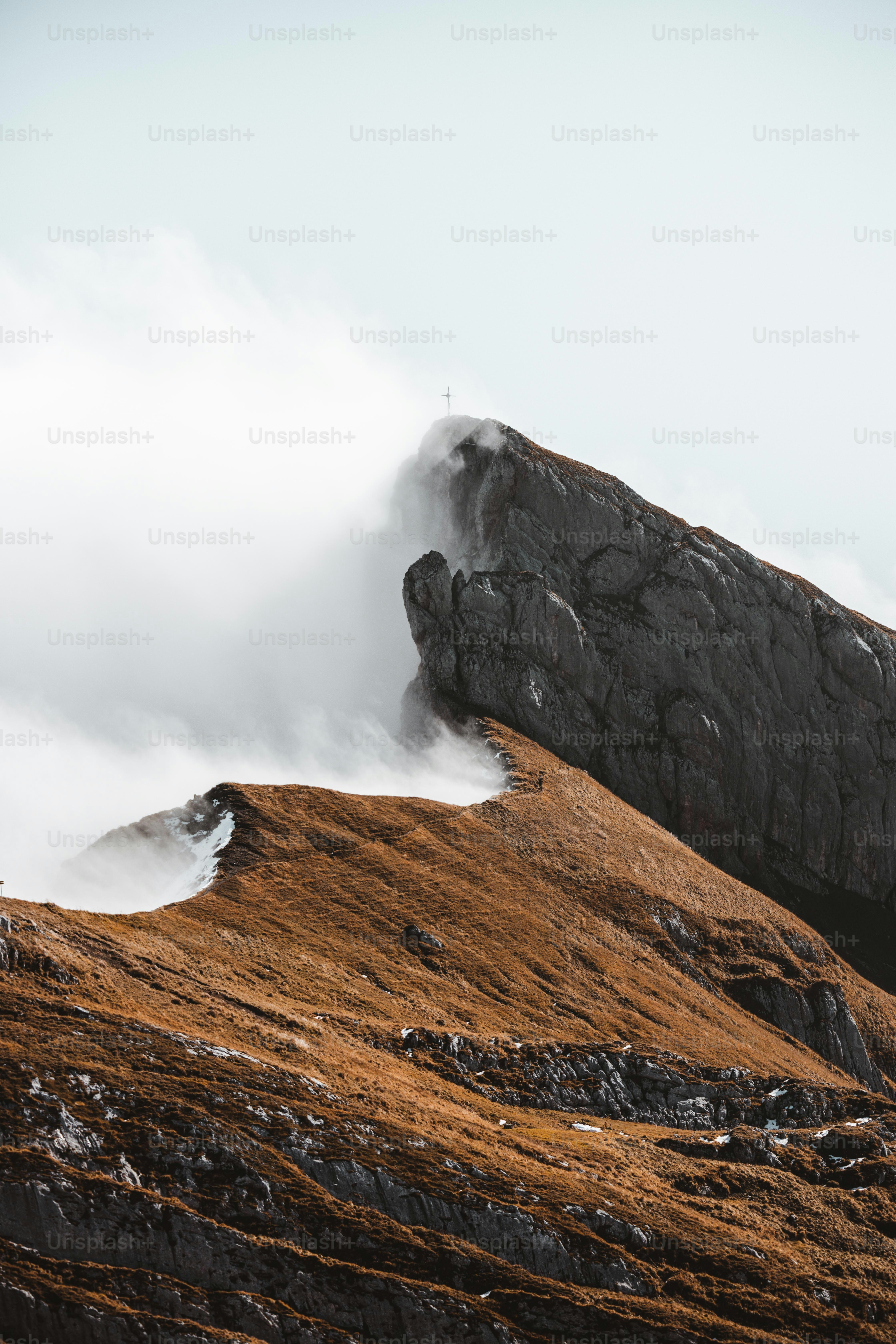 A view of a mountain range with snow on it photo – Austria Image on ...
