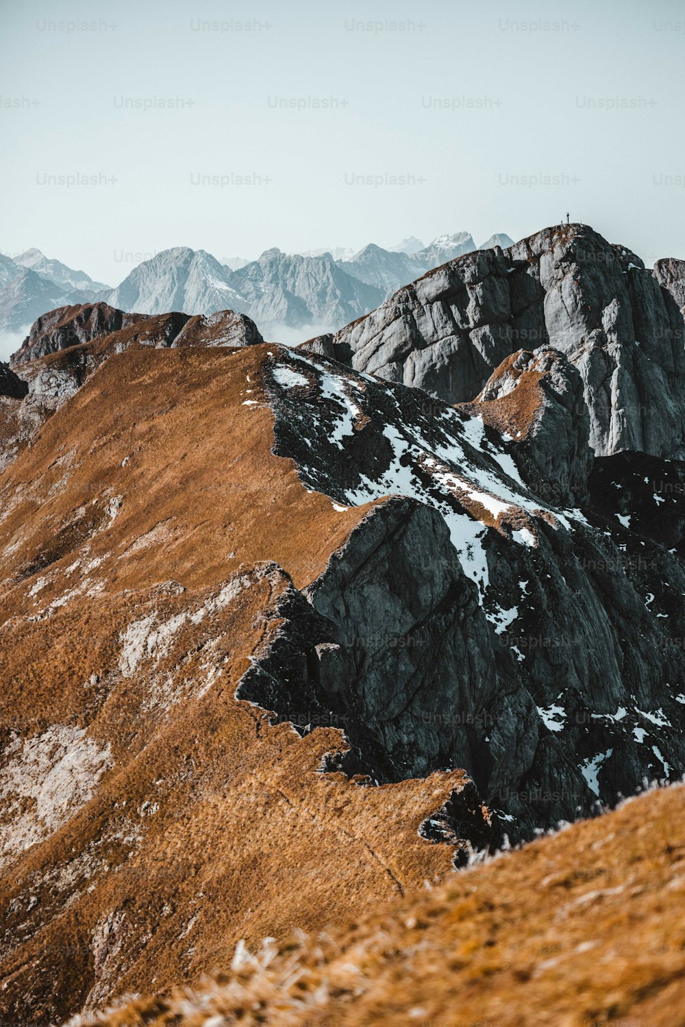 a mountain range with snow on the top of it