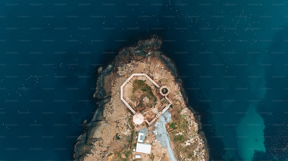 an aerial view of an island in the middle of the ocean