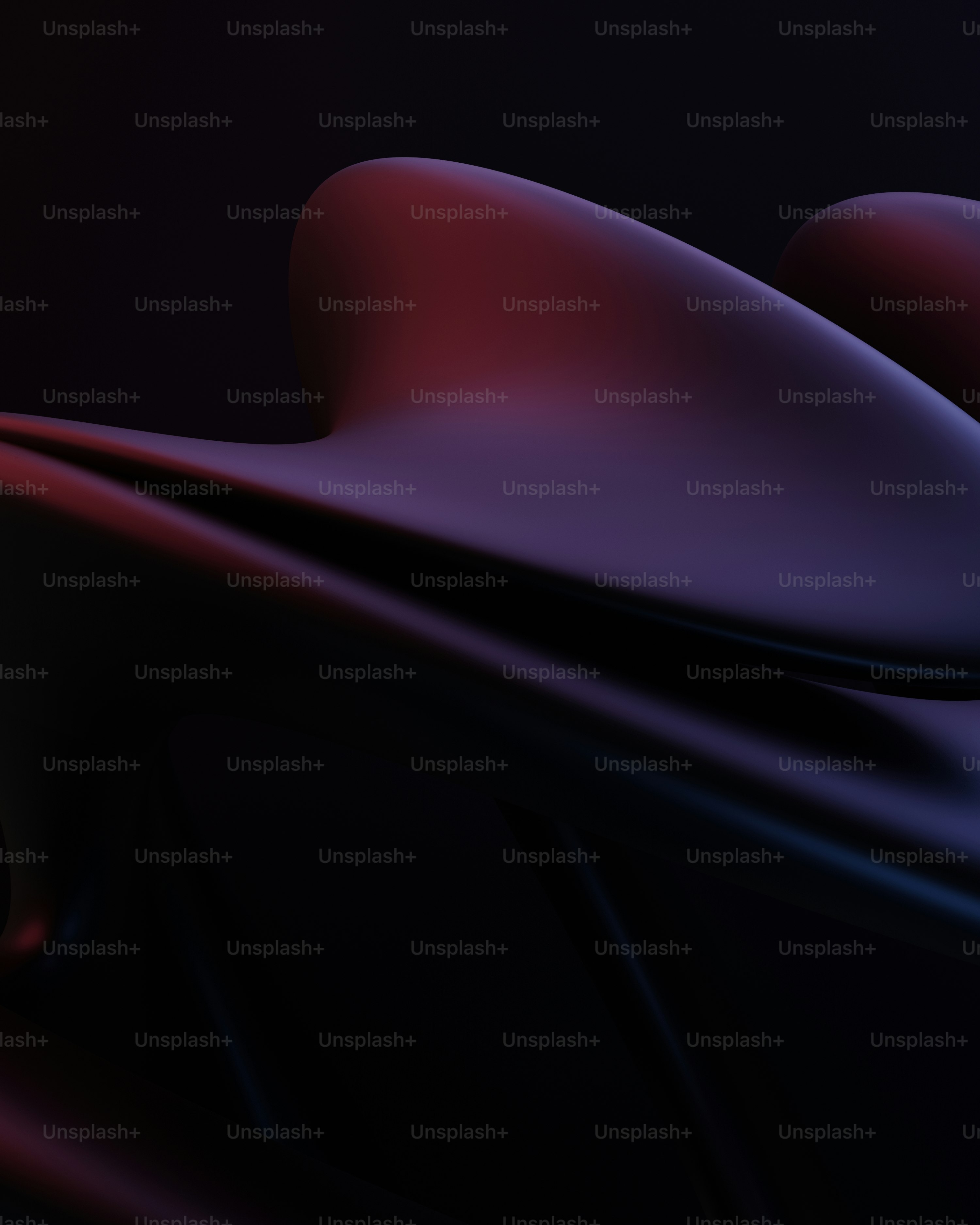 a close up of a red and black object