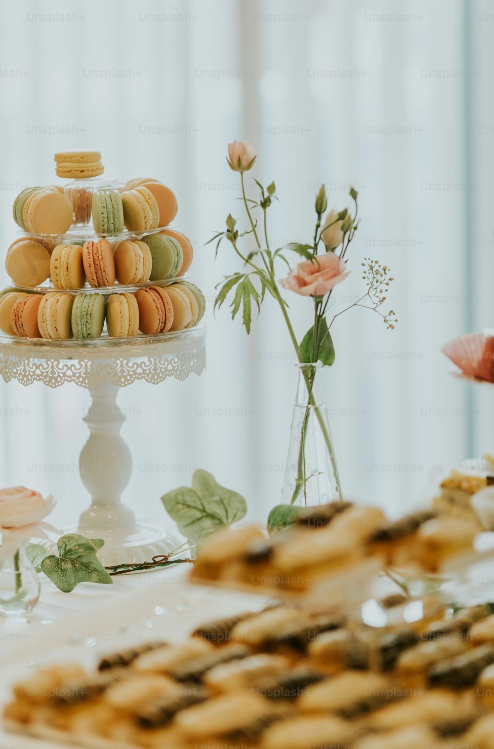 a table topped with lots of different types of cookies