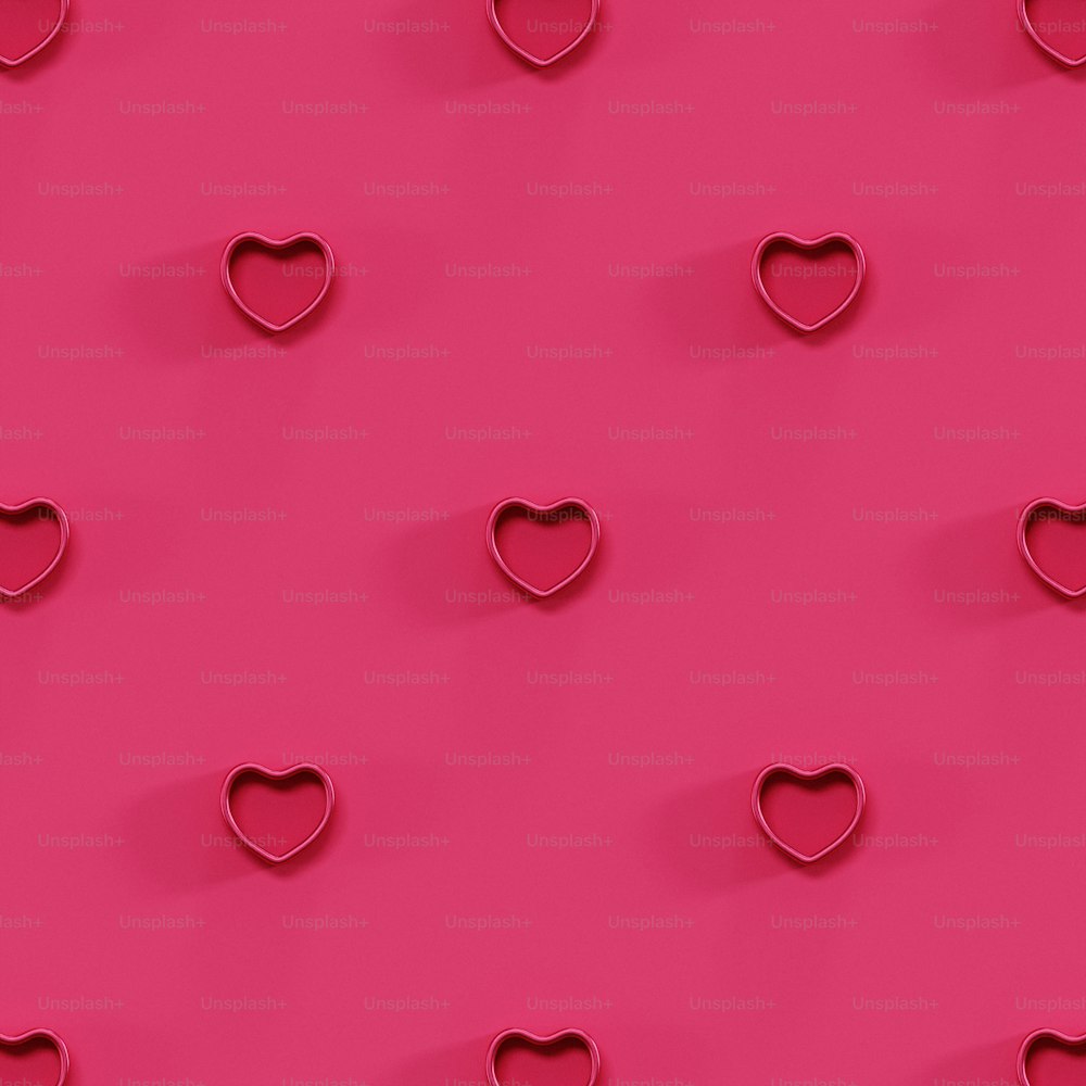 a pink background with hearts cut out of it
