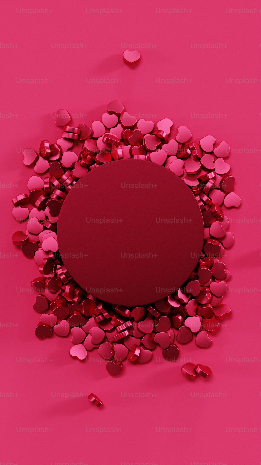 a red circle surrounded by hearts on a pink background