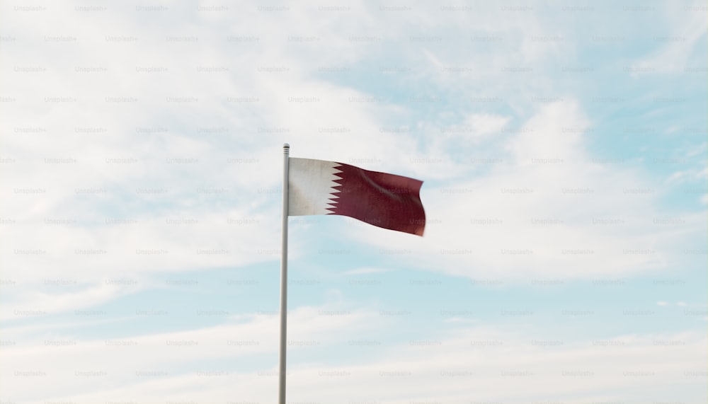 a red and white flag flying in the wind