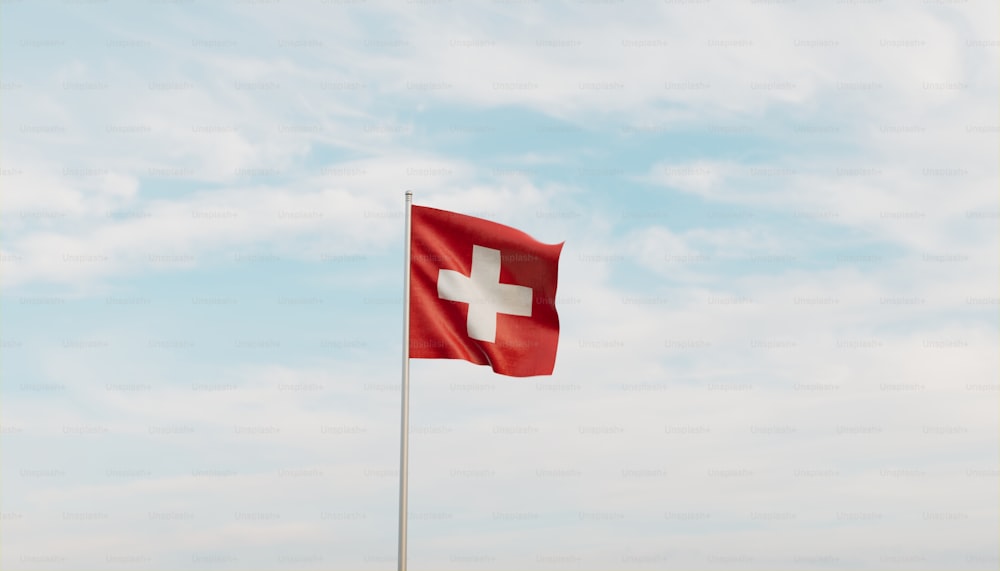 a swiss flag flying high in the sky