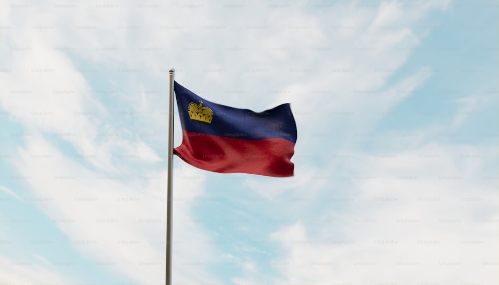 a flag flying in the wind with a blue sky in the background