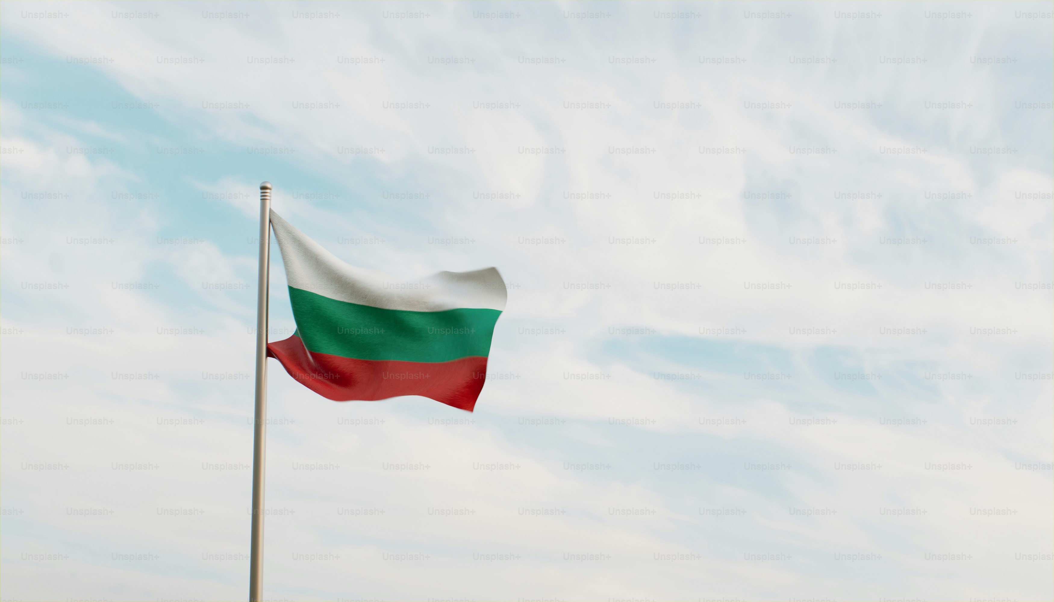 a flag waving in the wind on a cloudy day