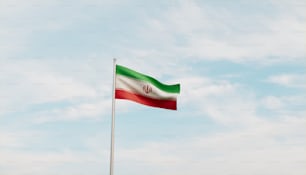 a flag flying in the wind on a cloudy day