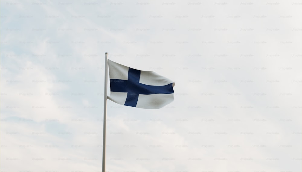 a flag flying in the wind on a cloudy day