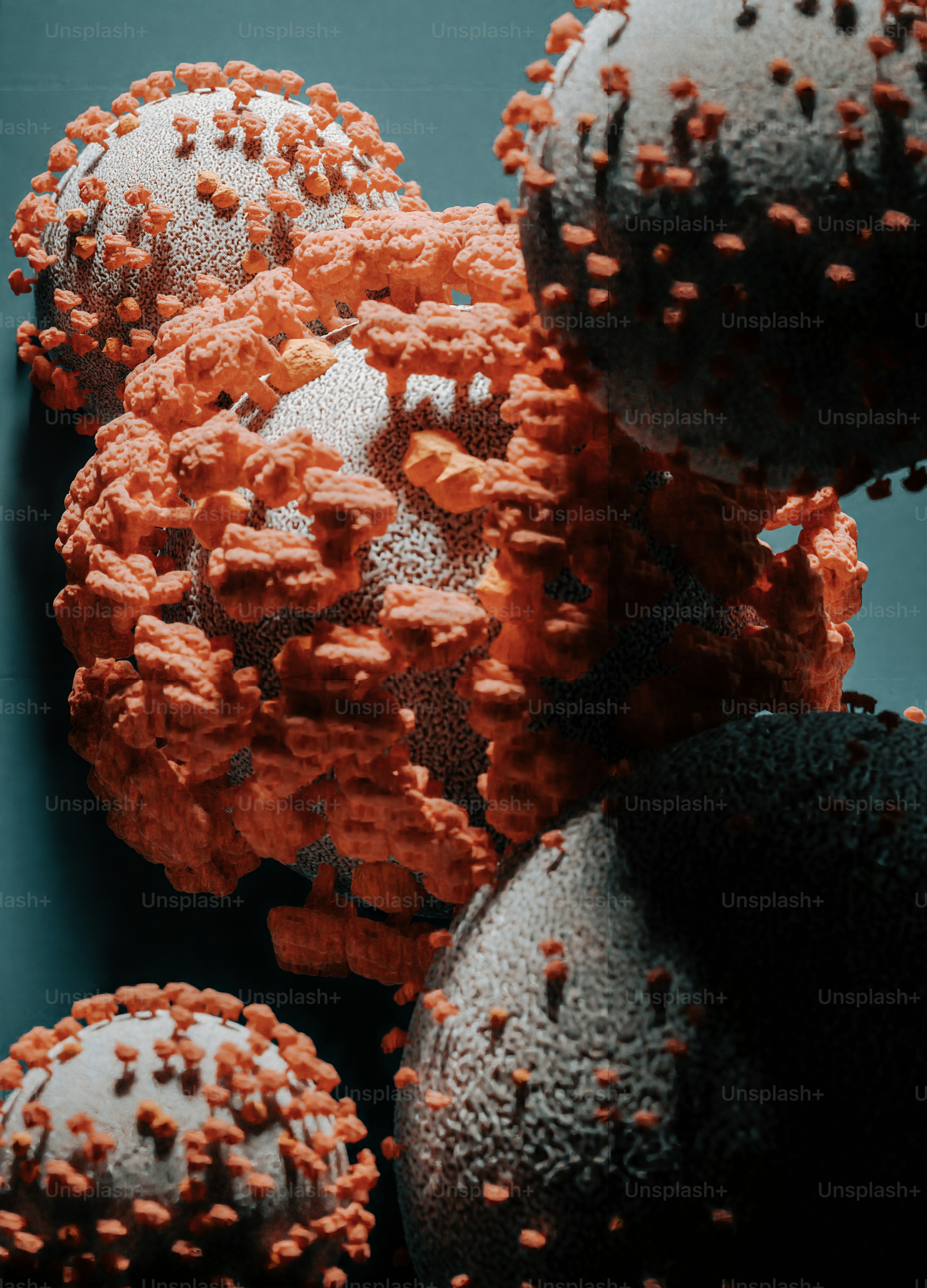 a bunch of orange and black balls on a table