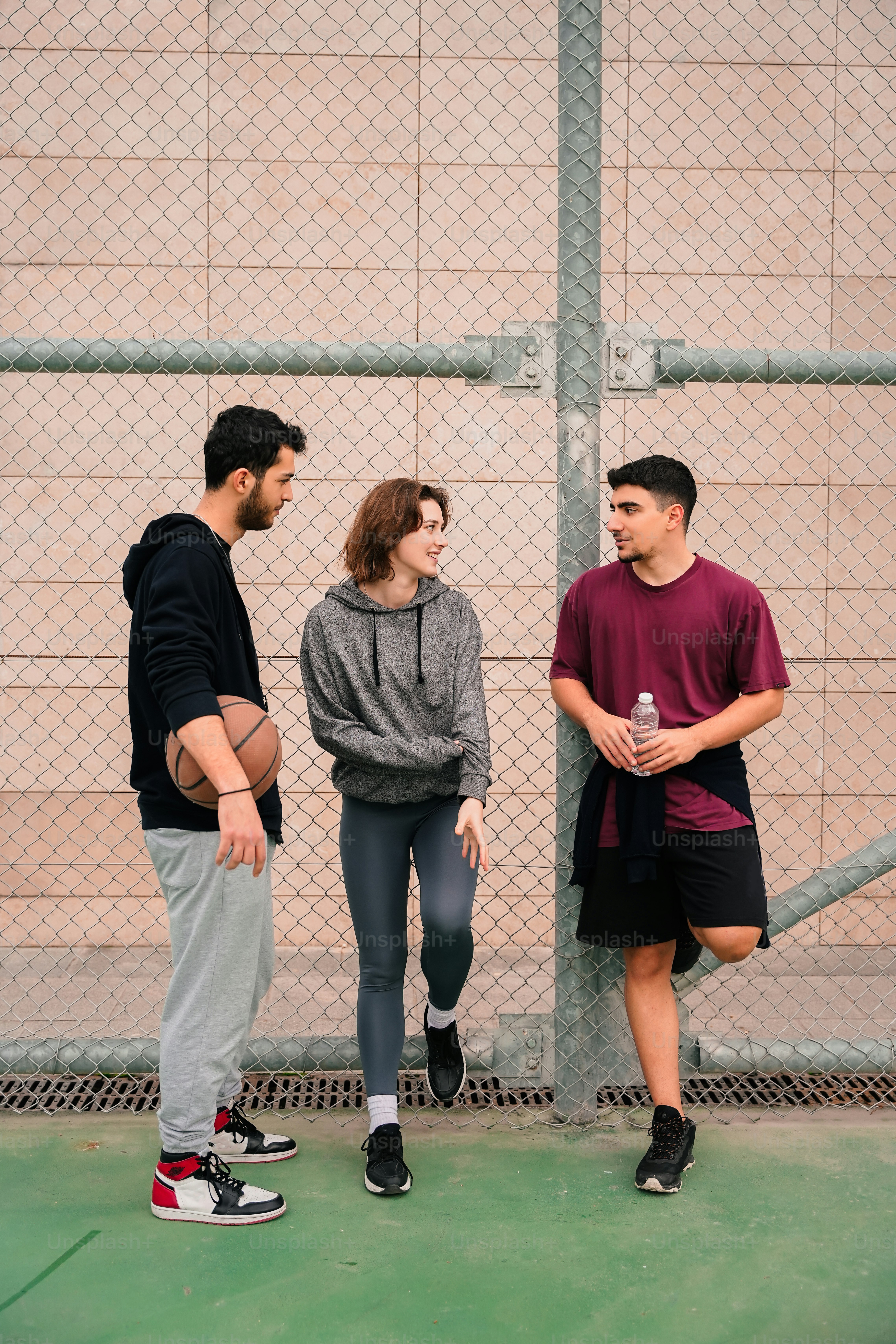 a group of young people standing next to each other