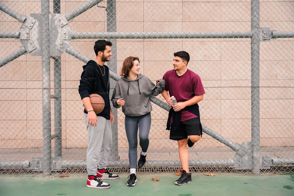 a group of young people standing next to each other