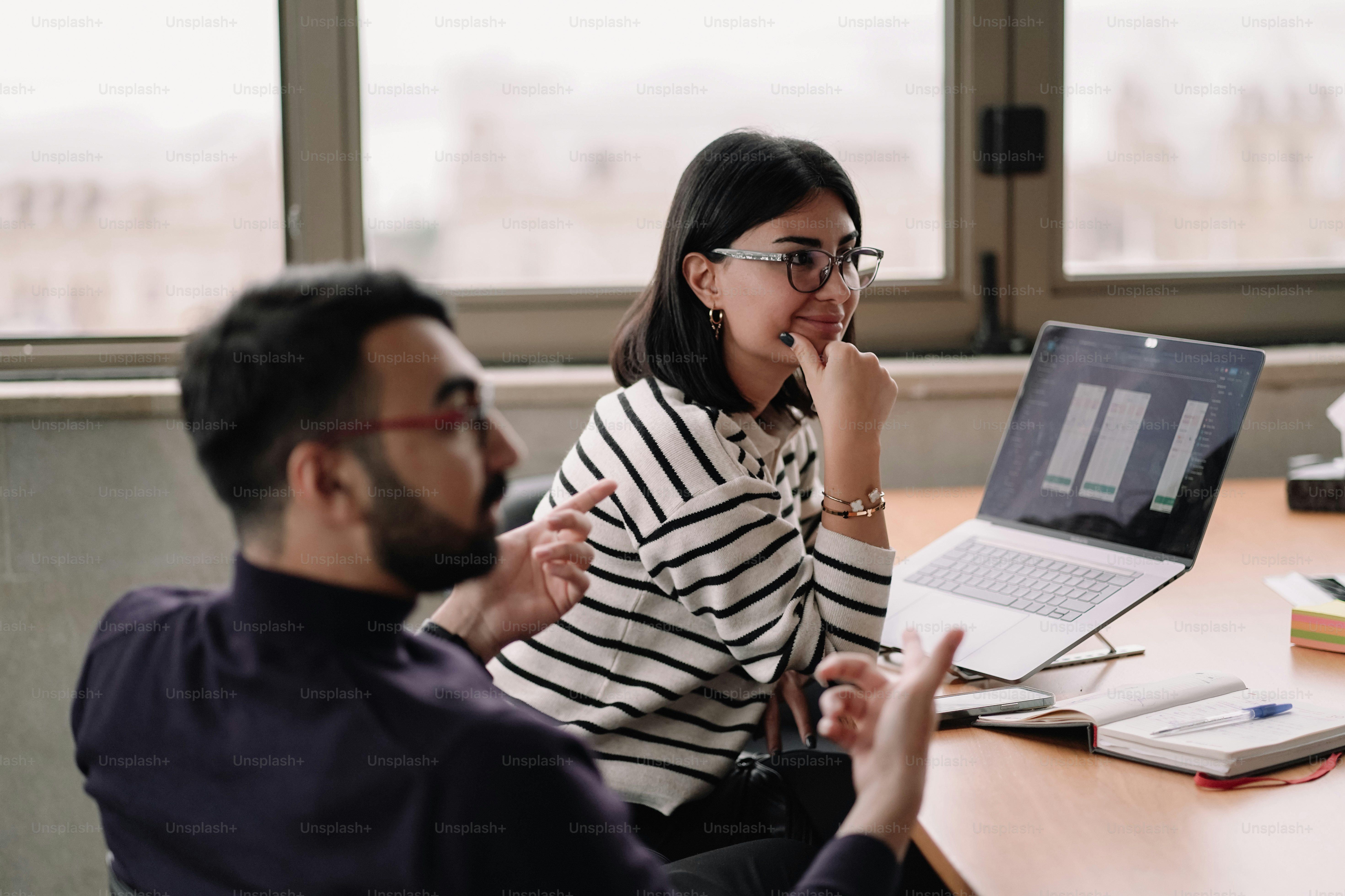 Graphic designers creating a mockup for a client